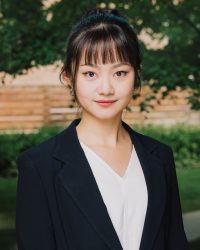 Headshot of Tiffany (Shujian) Wang.